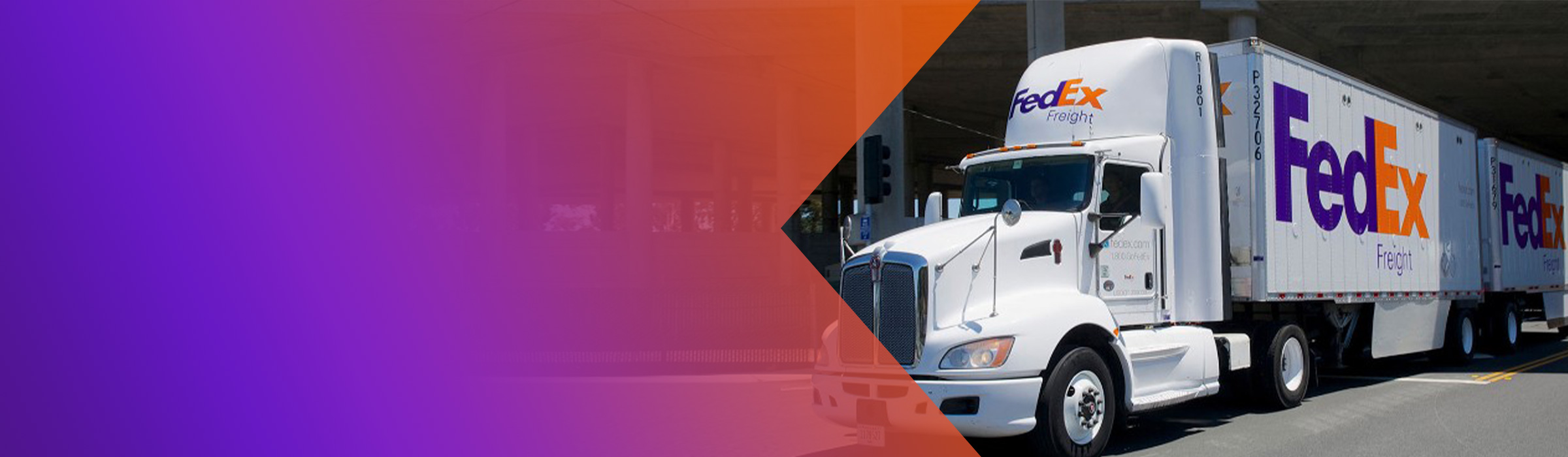 FedEx Freight truck under bridge