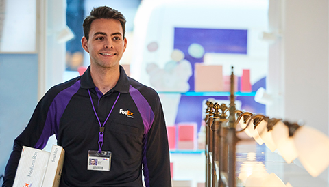 FedEx courier with a package