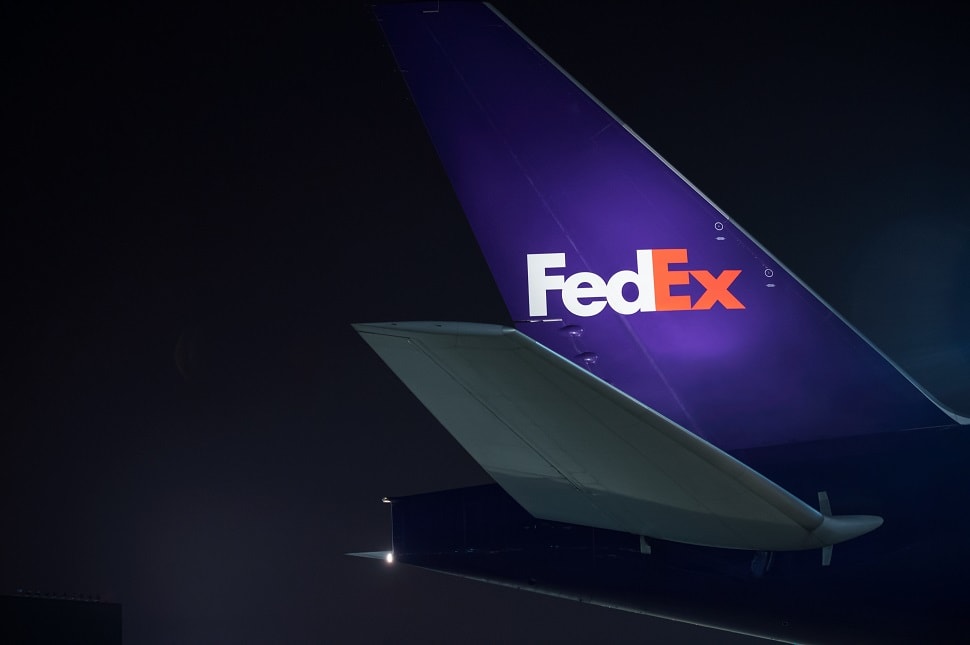 FedEx Express Freight employee with customer